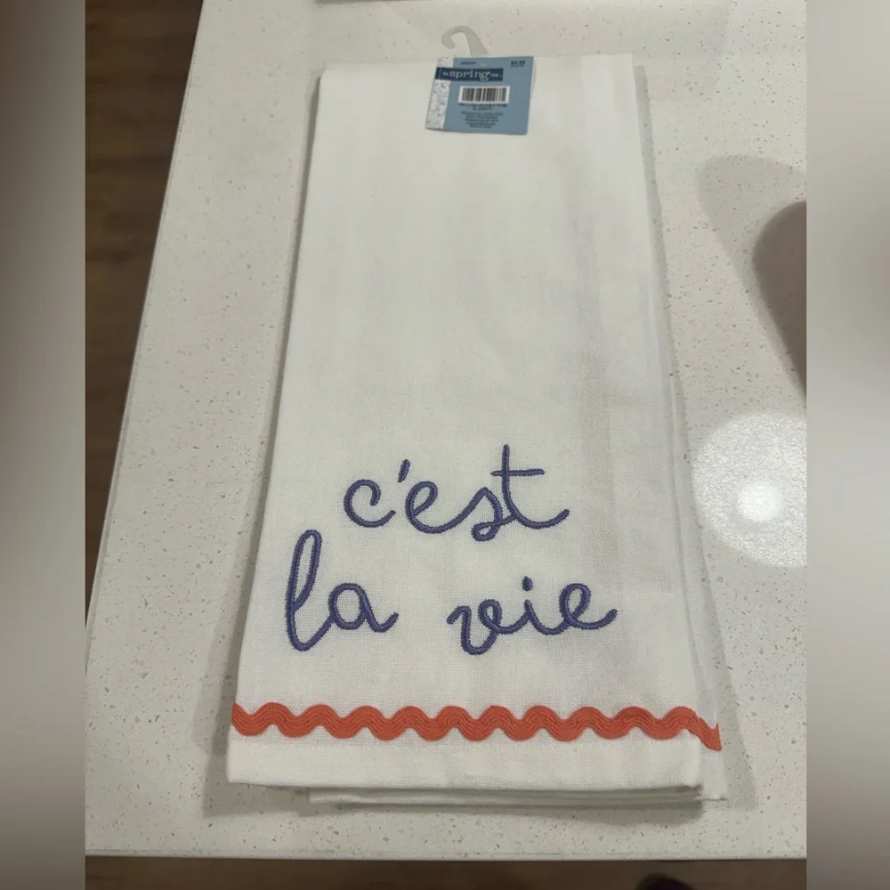 Embroidered Tea Towel with Lavender Writing and Pinkish Trim